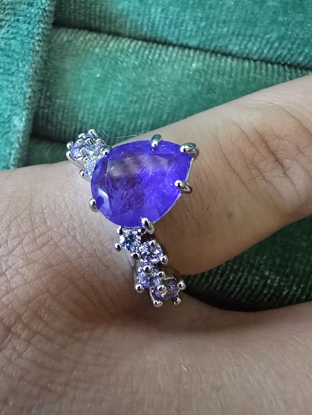Sterling Silver Pear-Cut Purple Gemstone Ring with Accent Stones